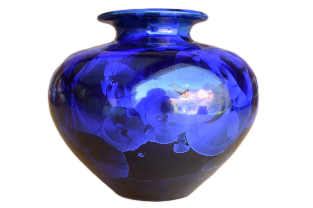 Rounded Dark Blue Ceramic Vase with Iridescent Flower Shapes