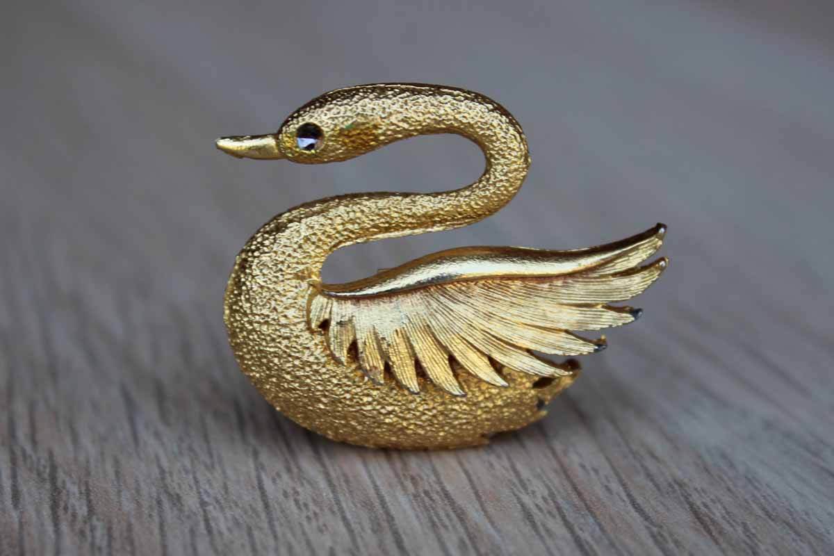 Gold Tone Swan Brooch with Rhinestone Eye and Shaped Wing