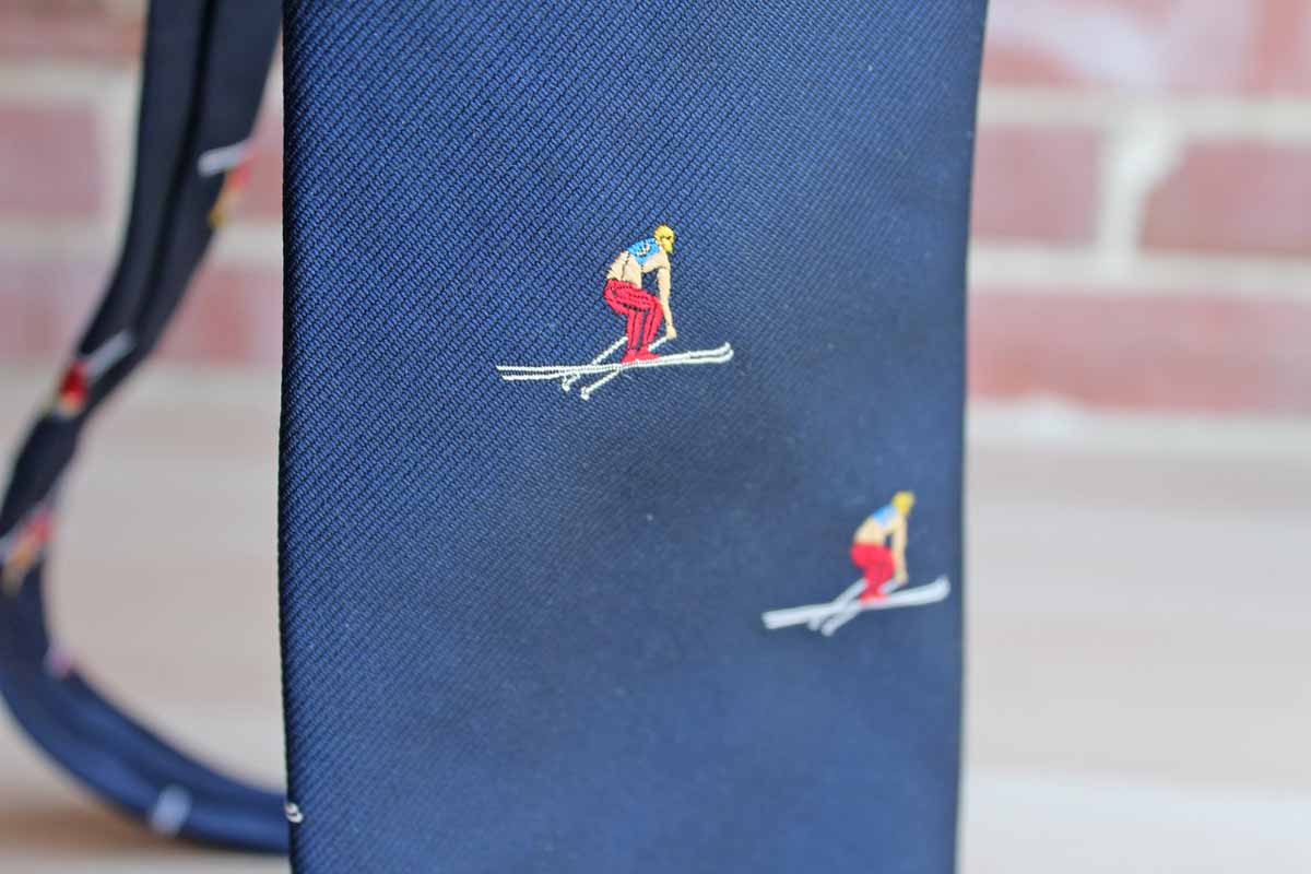 Polyester Necktie Decorated with Repeating Pattern of Colorful Racing Alpine Skiers