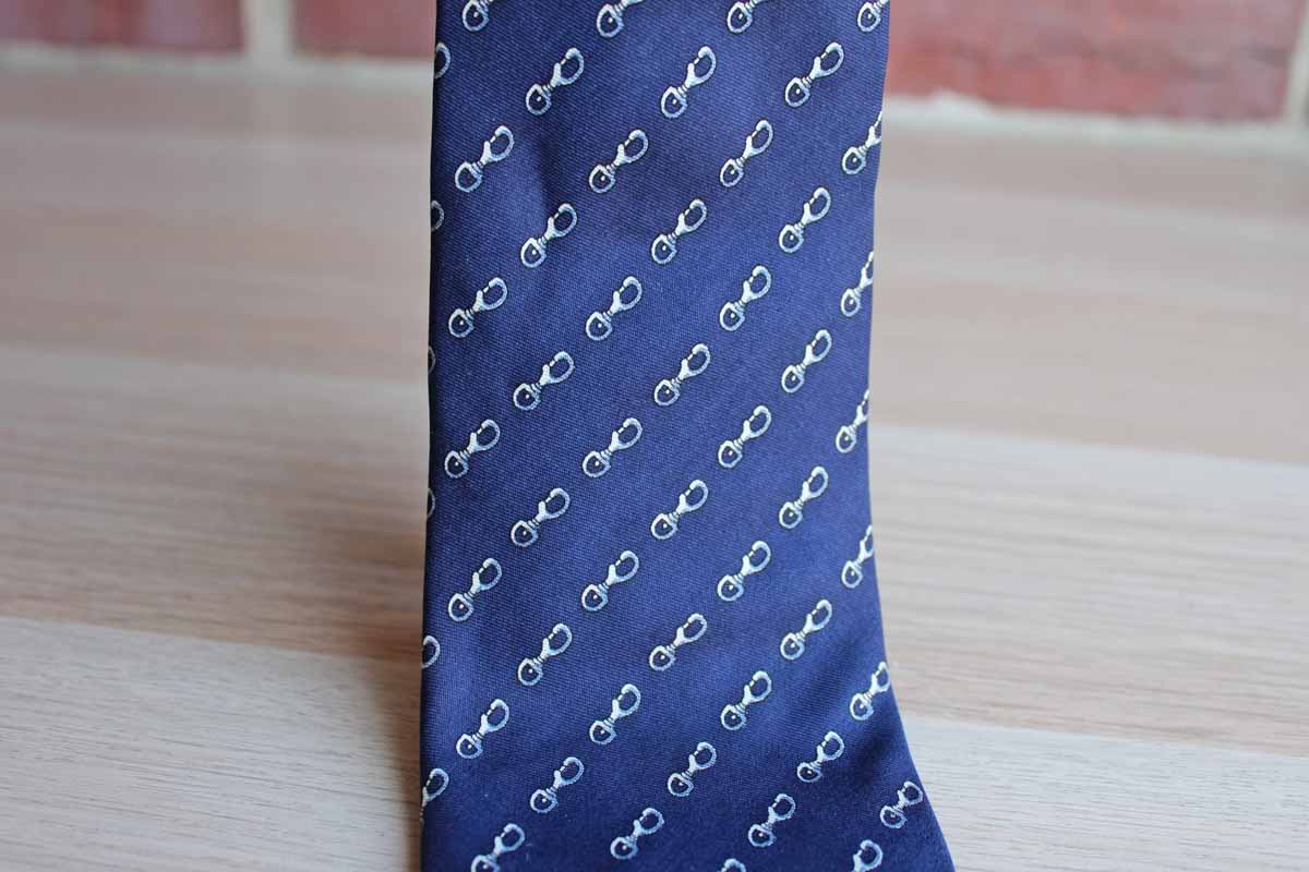 Lord & Taylor 100% Silk Necktie Decorated with Swivel Eye Bolt Snap Hooks on Navy Blue Background