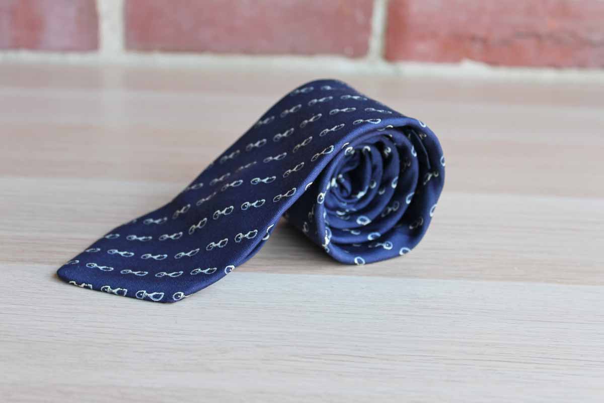 Lord & Taylor 100% Silk Necktie Decorated with Swivel Eye Bolt Snap Hooks on Navy Blue Background