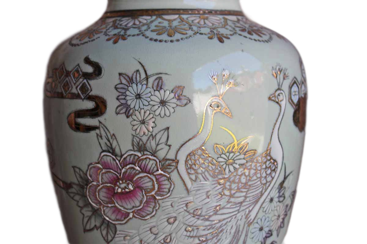 Baluster Shaped Moriaged Vases Depicting Lilac, Gold and White Peacocks and Flowers Over an Off White Background