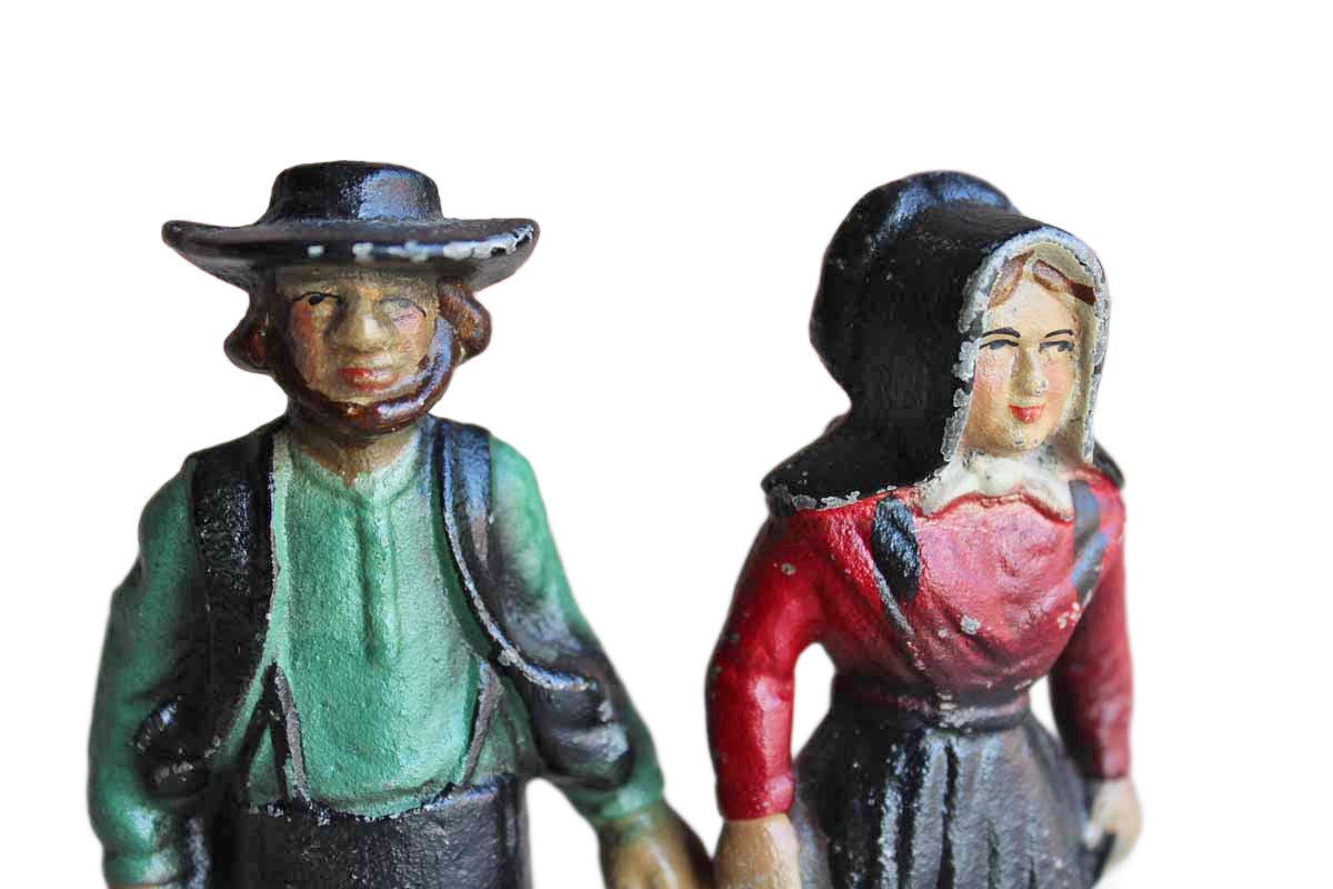 Cast Iron Amish Couple Figurines
