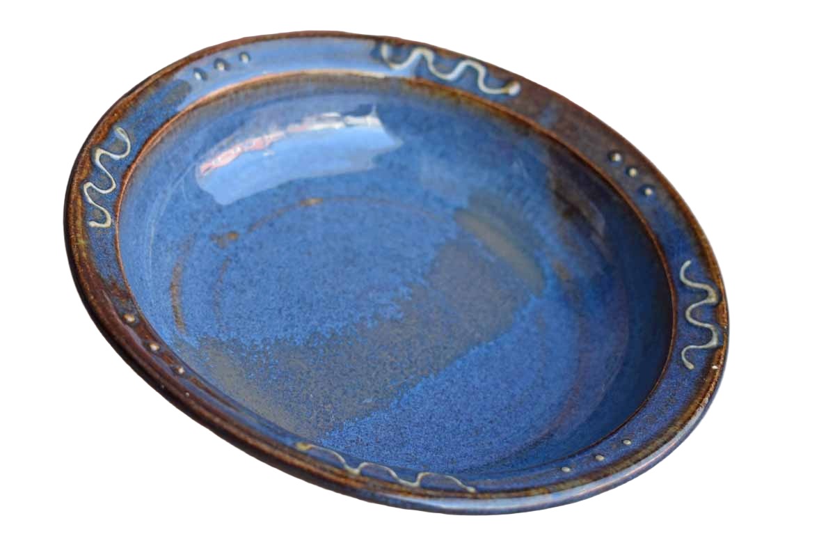Shallow Ceramic Bowl with Bluish-Brown Glazes and Curvy Rim Designs