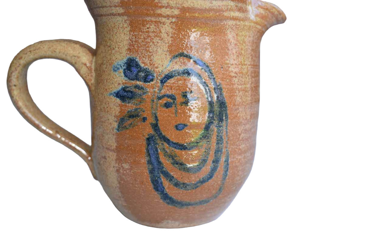 Small Stoneware Handled Pitcher with Blue Woman on Front