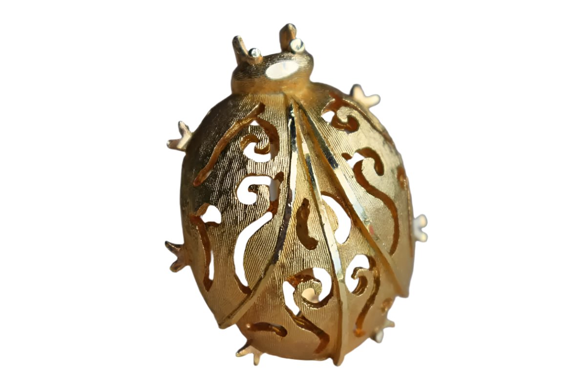 Gold Tone Metal Ladybug Brooch with Filigree Designs