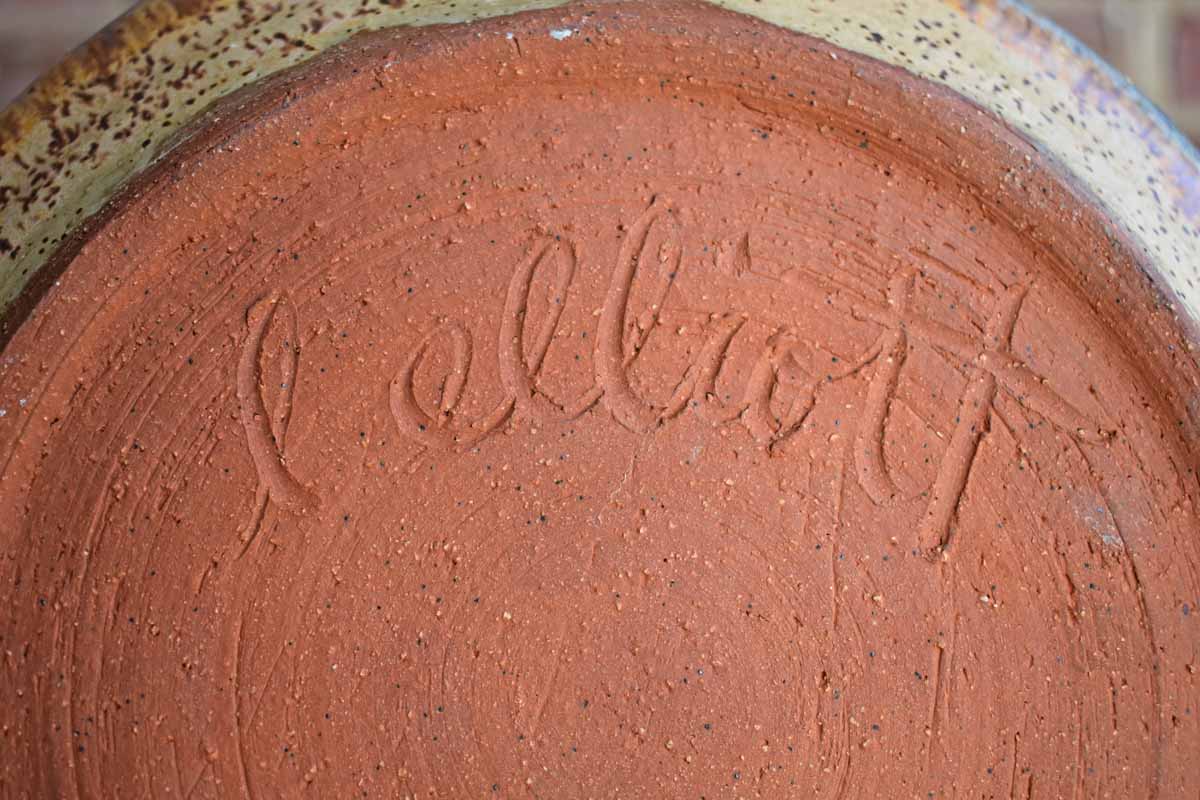 Old Stoneware Plate with Purple and Speckled Tan Glazes