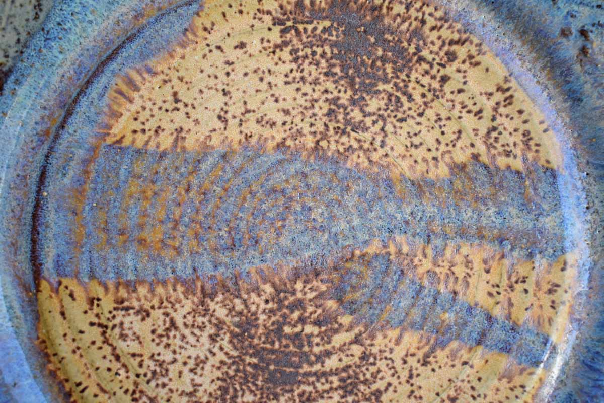 Old Stoneware Plate with Purple and Speckled Tan Glazes