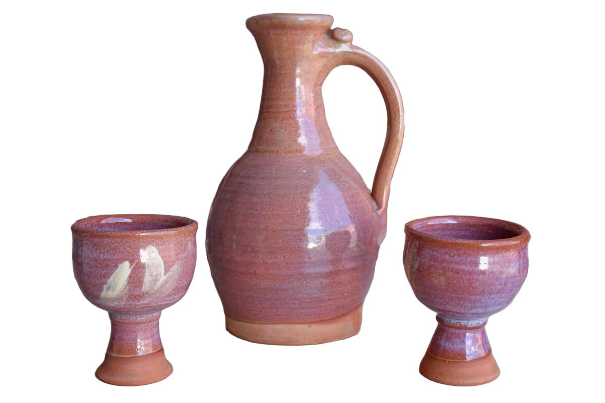 Pink Stoneware Decanter and Pair of Goblets