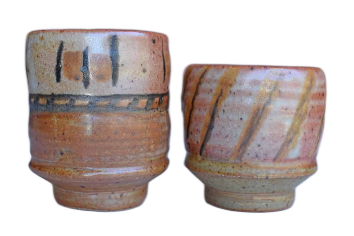 Pair of Pottery Cups of Different Sizes and Shapes