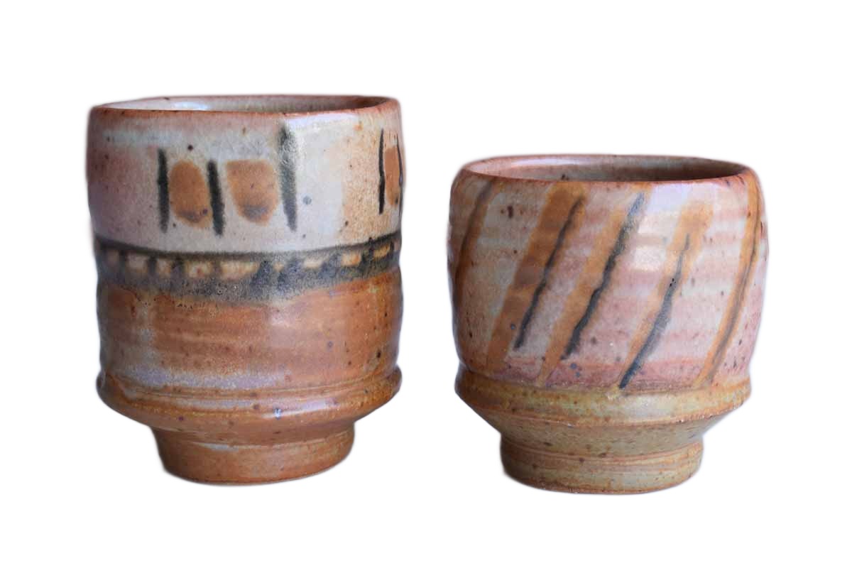 Pair of Pottery Cups of Different Sizes and Shapes