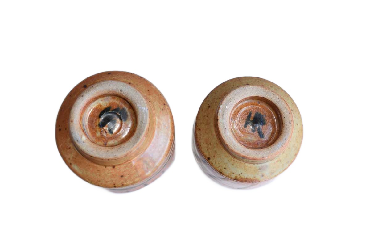 Pair of Pottery Cups of Different Sizes and Shapes