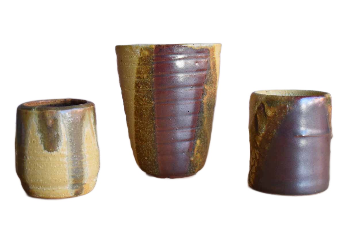 Yellow, Brick Red, and Tan Stoneware Cups