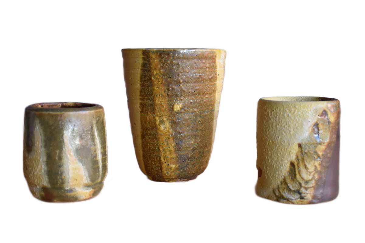 Yellow, Brick Red, and Tan Stoneware Cups