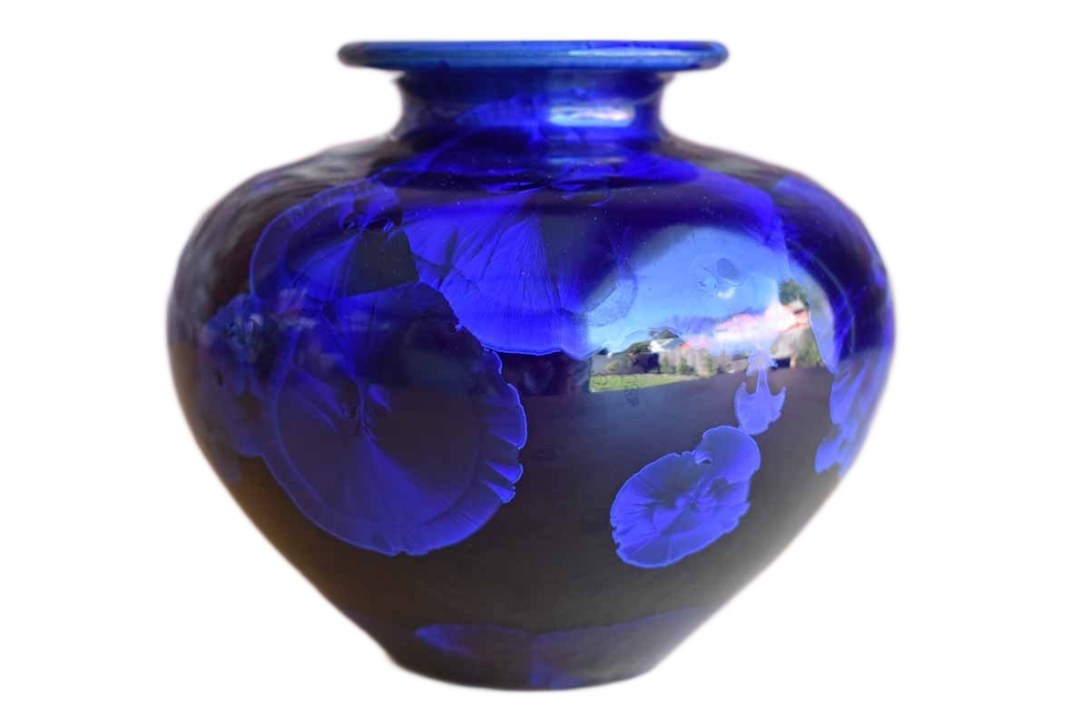 Rounded Dark Blue Ceramic Vase with Iridescent Flower Shapes