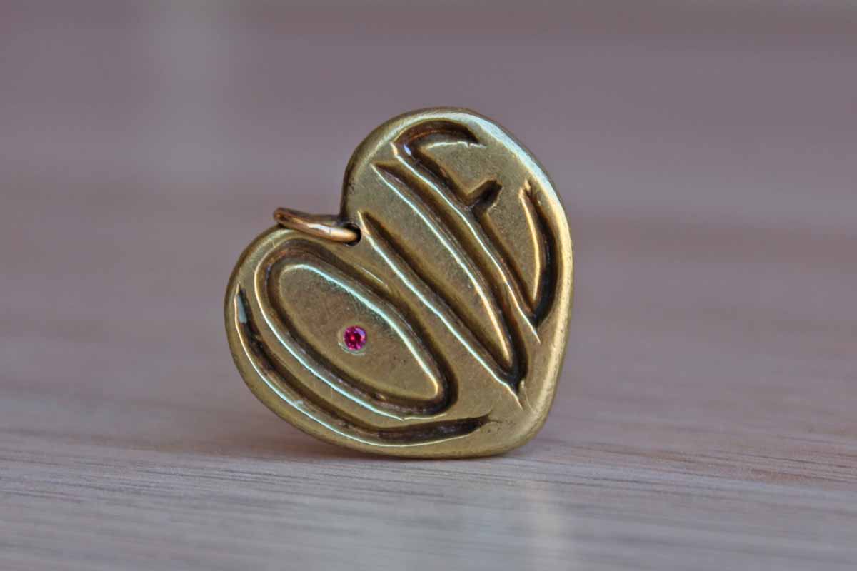 Brass "Love" Charm with Little Red Inset Rhinestone