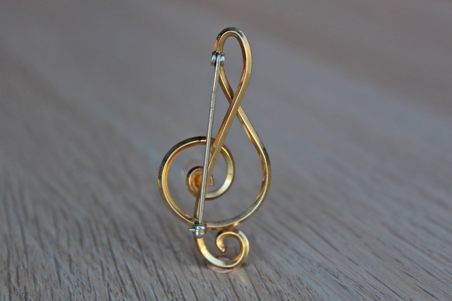 Gold Tone Treble Clef Brooch with Faux Pearl Accent
