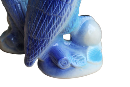 Ceramic Blue Parrots Clutching Flowering Fruit, A Pair