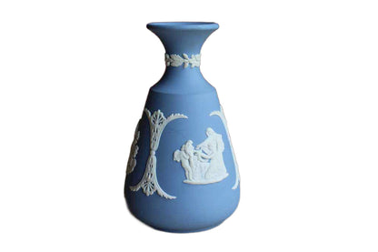 Wedgwood (England) Blue Jasperware "Cupid Asleep," "Aurora," and "Cupid as Oracle" Cameo Bud Vase