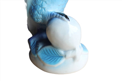 Ceramic Blue Parrots Clutching Flowering Fruit, A Pair