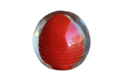 Solid Glass Paperweight with Orange Anemone-Like Design