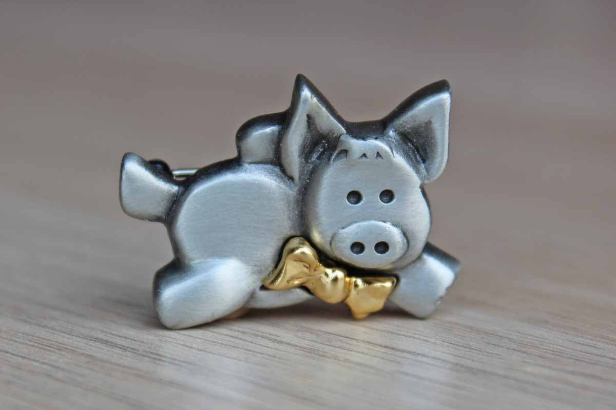 Silver Tone Flying Pig Wearing a Gold Bowtie Brooch