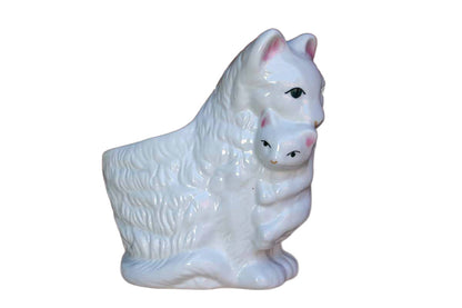 Glossy White Porcelain Planter of a Mother Cat Holding Kitten with Her Mouth