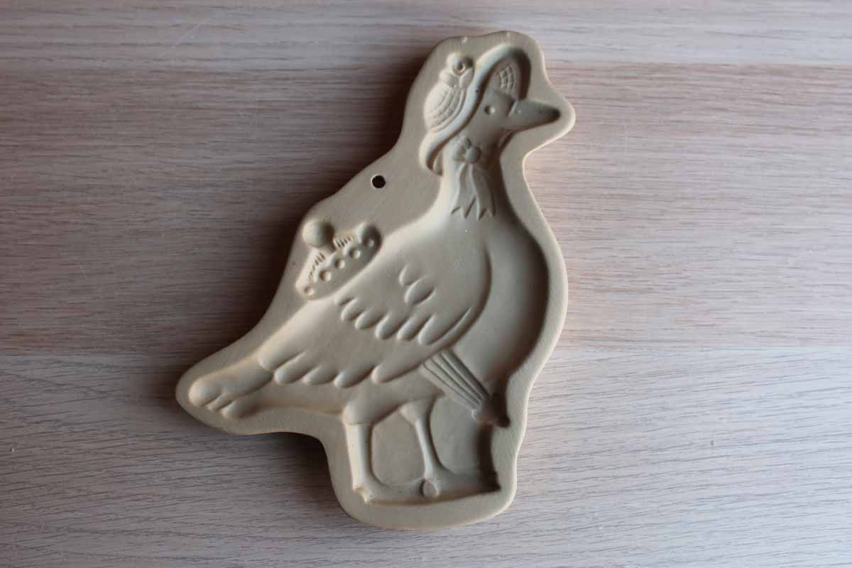 Brown Bag Cookie Art (New Hampshine, USA) 1992 Stoneware Cookie Mold of a Duck Wearing a Rain Hat and Carrying an Umbrella
