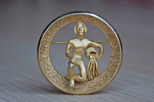 Trifari (USA) Gold Tone Aquarius the Water Bearer Zodiac Brooch (January 20-February 18)