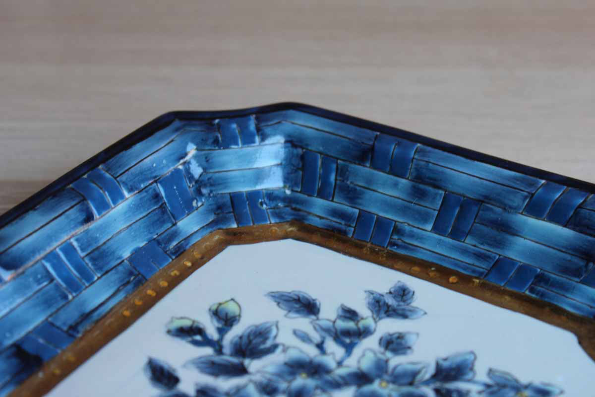 Ceramic Dish with Blue Basketweave Pattern Surrounding Floral Center