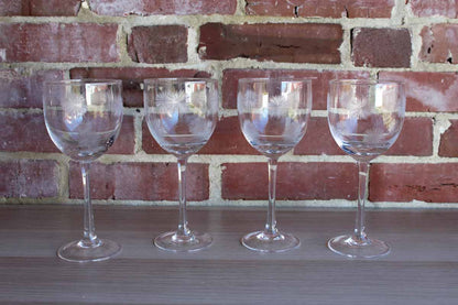 Tall Stemmed Wine Glasses Decorated with Etched Dandelion-Like Flowers