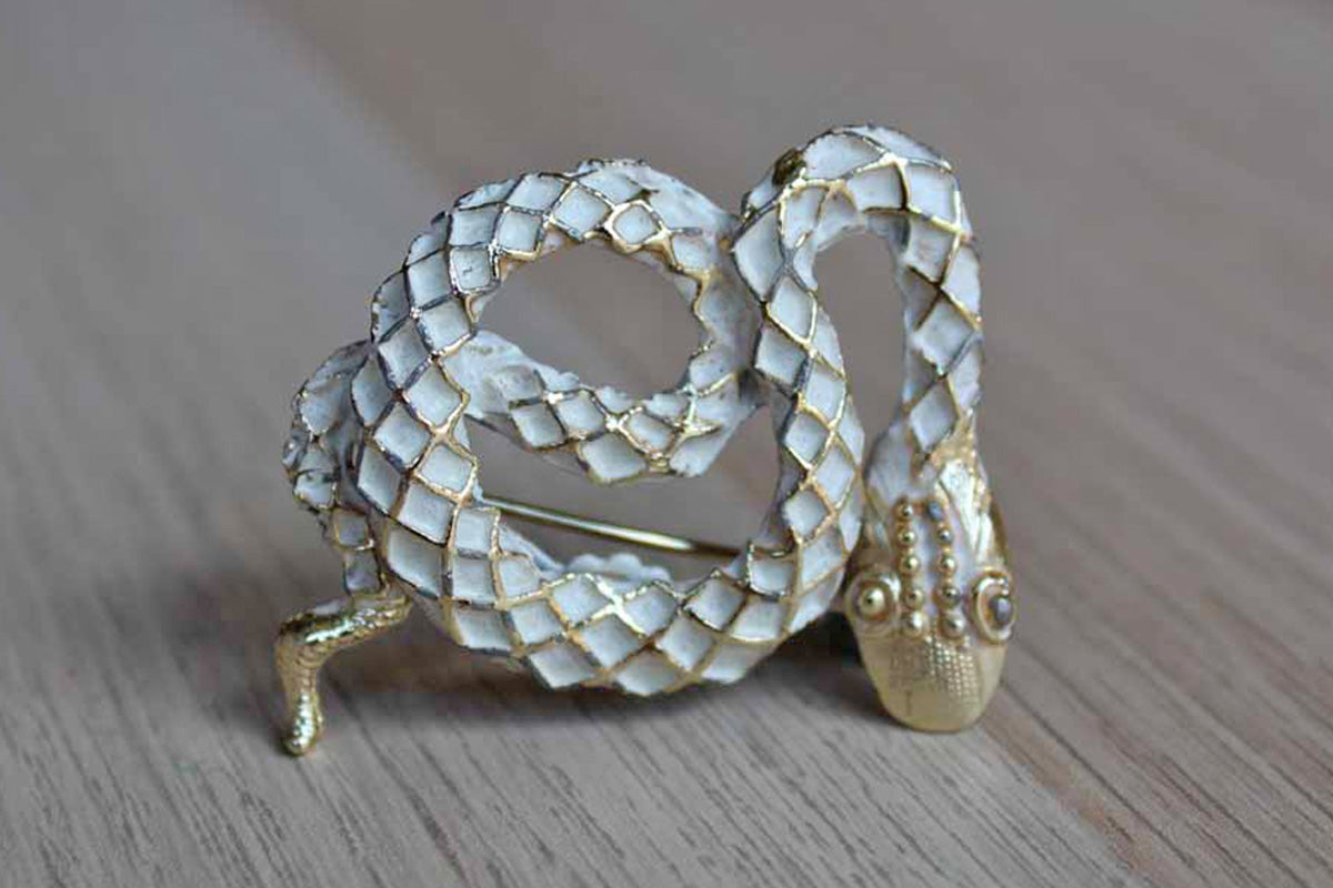 Gold Tone and White Painted Snake Brooch