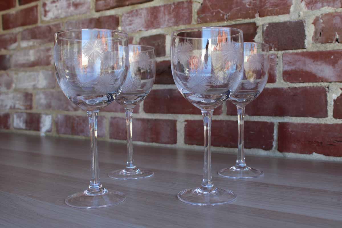 Tall Stemmed Wine Glasses Decorated with Etched Dandelion-Like Flowers
