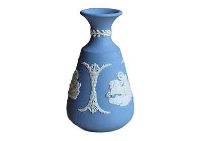 Wedgwood (England) Blue Jasperware "Cupid Asleep," "Aurora," and "Cupid as Oracle" Cameo Bud Vase