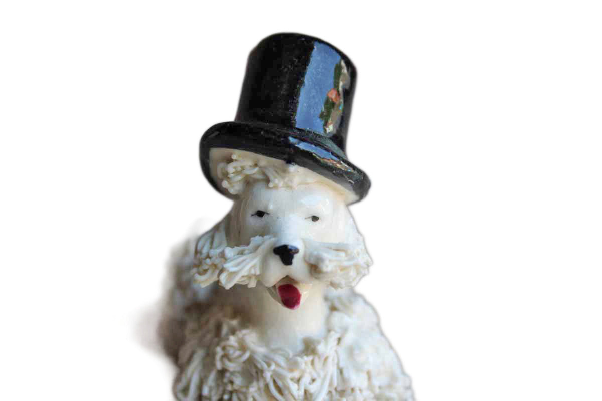 White Porcelain Spaghetti Poodle Wearing a Top Hat