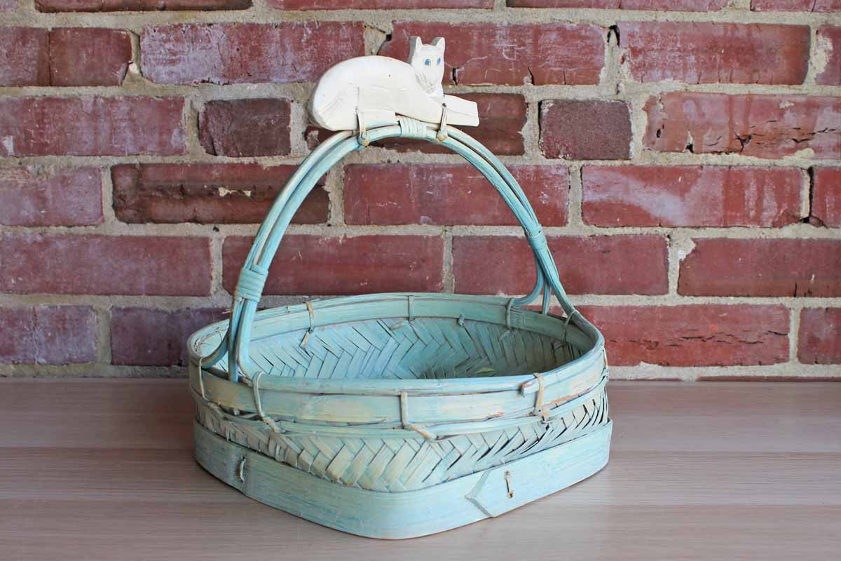 Hand Woven Blue Painted Basket with Decoratively Carved Cat