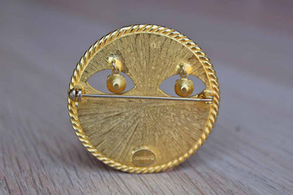 Jeanne (New York) Gold Tone Modern Sun Brooch with Dangling Silver Rhinestone Eyes