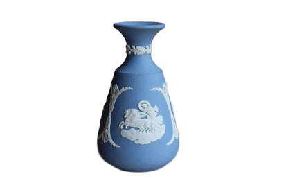 Wedgwood (England) Blue Jasperware "Cupid Asleep," "Aurora," and "Cupid as Oracle" Cameo Bud Vase