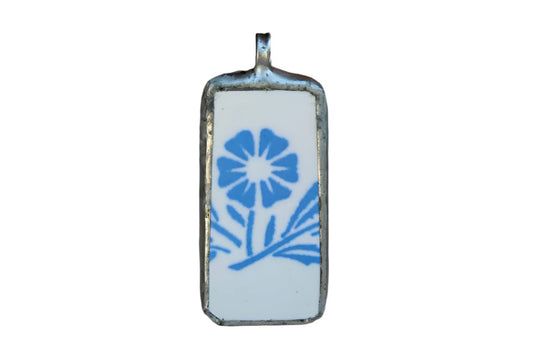 Custom-Made Charm of a Blue Cornflower Pottery Shard Encased in Silver