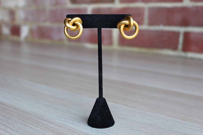 Gold Tone Pierced Earrings Shaped Like Knots