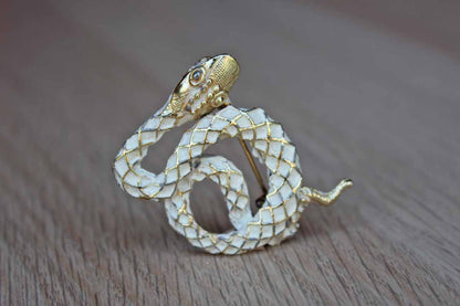 Gold Tone and White Painted Snake Brooch