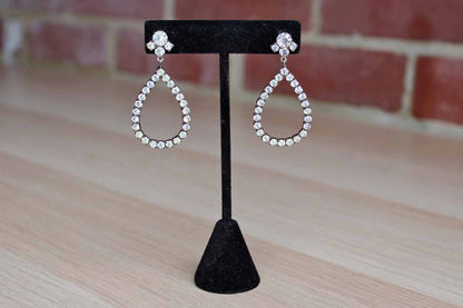 Silver Tone Rhinestone Drop Pierced Earrings with Pear-Shaped Design