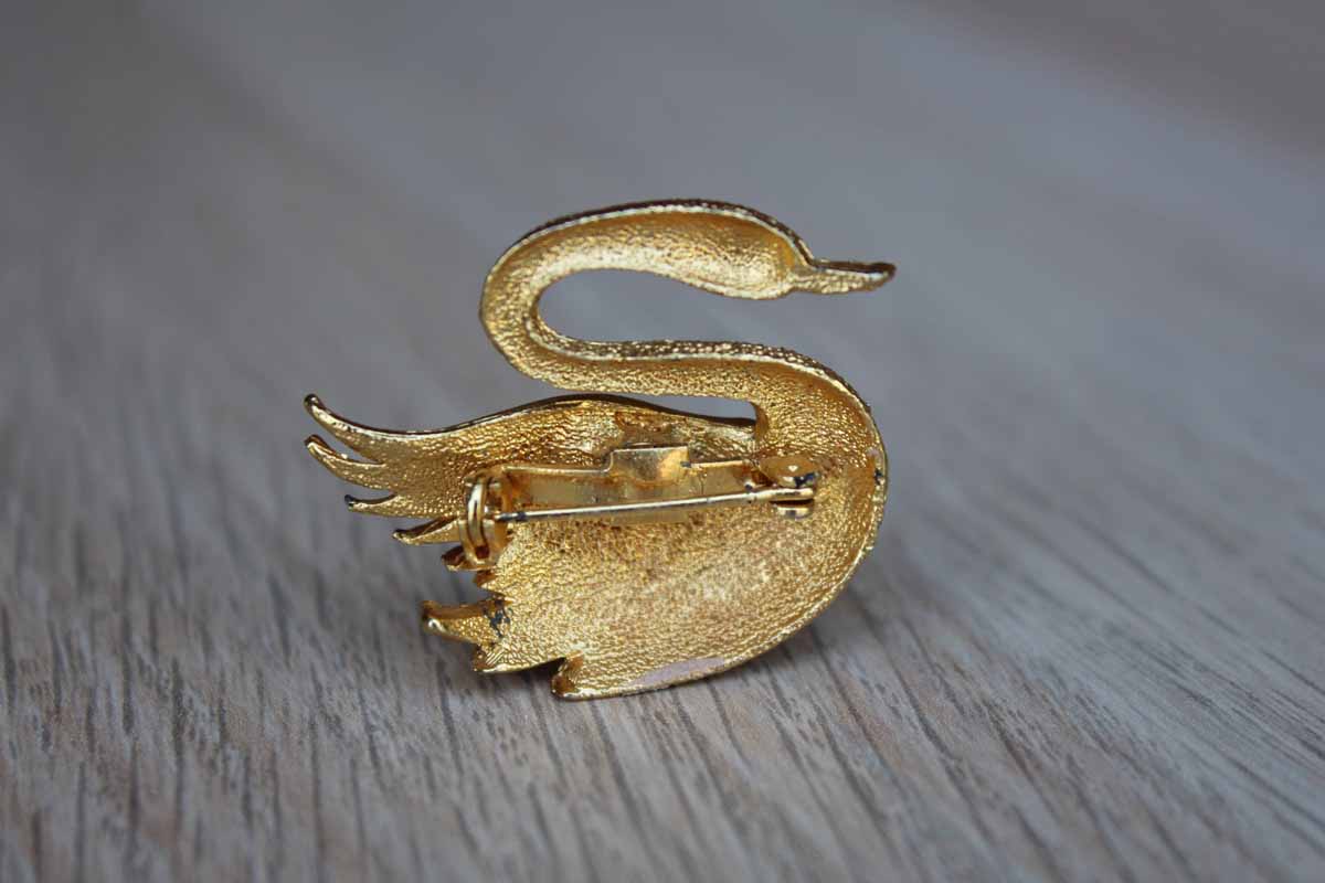 Gold Tone Swan Brooch with Rhinestone Eye and Shaped Wing