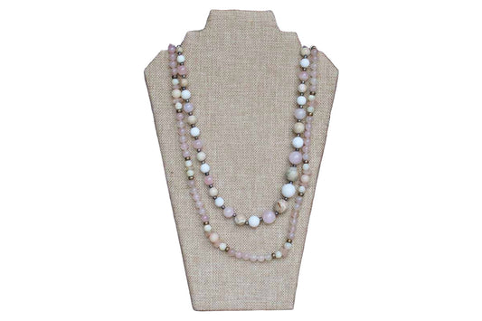 A Pair of Polished Pinkish-Purple and Cream Stone Bead Necklaces