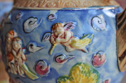 Hinode (Japan) Vibrantly Colored Urn Vases with Cherubs and Angels, A Pair