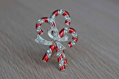 Monet (New York, USA) Red Enamel Candy Canes Wrapped in a Rhinestones Bow Brooch