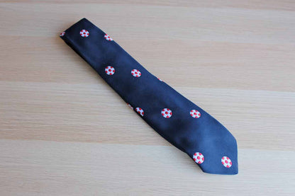 Pintail Polyester Necktie Decorated with Red and White Soccer Balls on Navy Blue Background