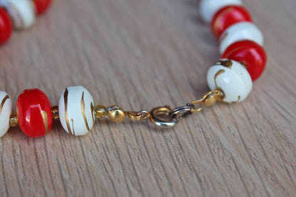 Long Red and White Painted Wood Beaded Necklace with Dripped On Gold Accents