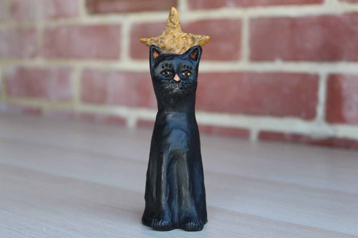 E. Smithson Black Resin Cat with Gold Star Abive its Head