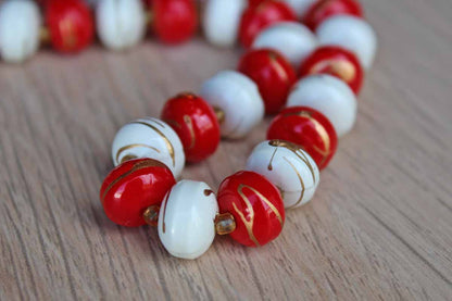 Long Red and White Painted Wood Beaded Necklace with Dripped On Gold Accents